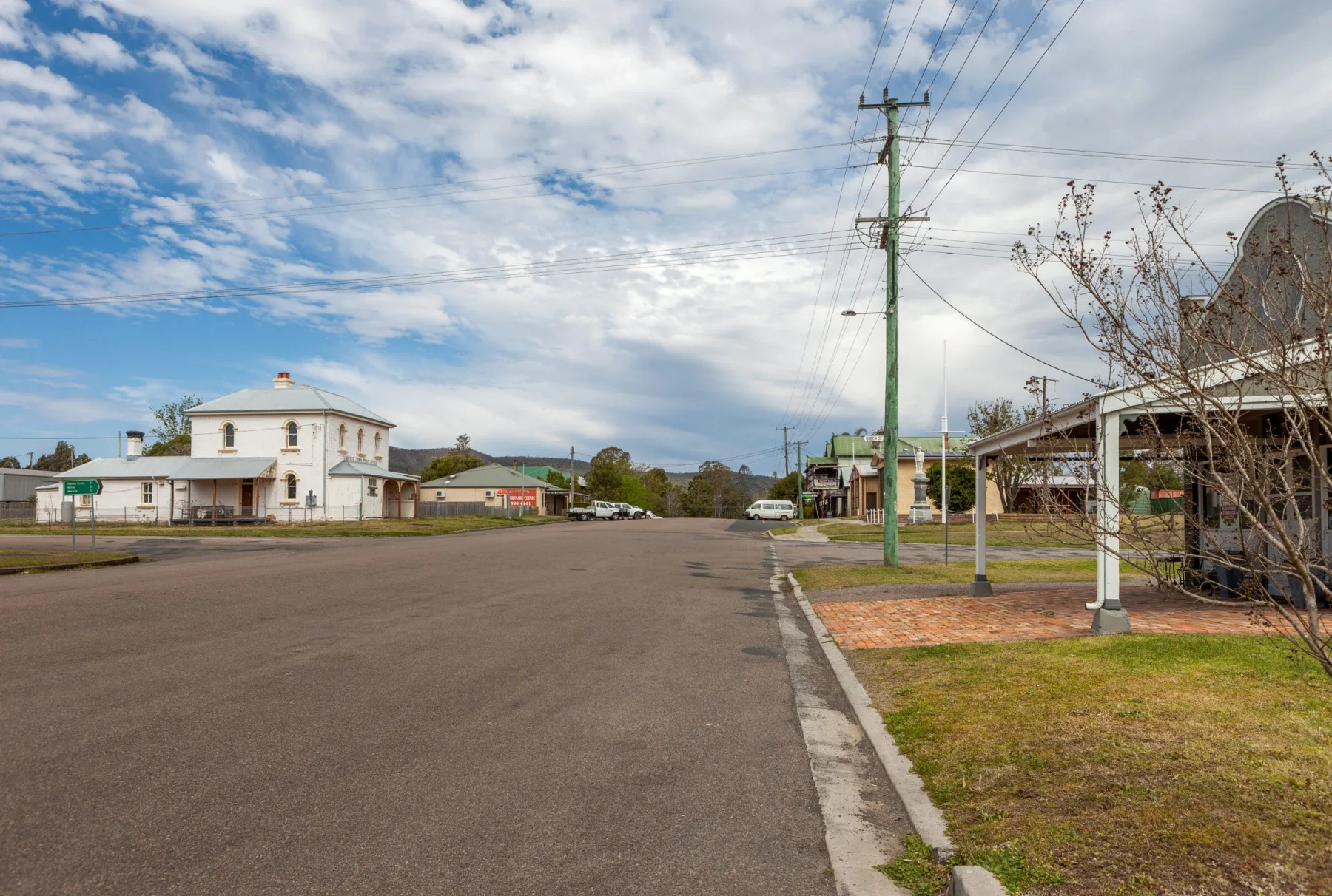 A wide shot of a quiet street in a rural town