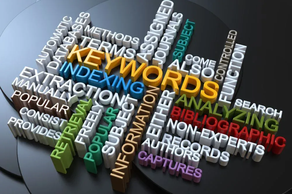 A 3D word cloud composed of colourful, raised block letters on a dark background.