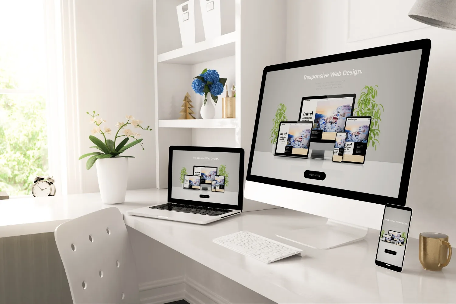 desktop computer, laptop, and smartphone are arranged on a desk in a home office.